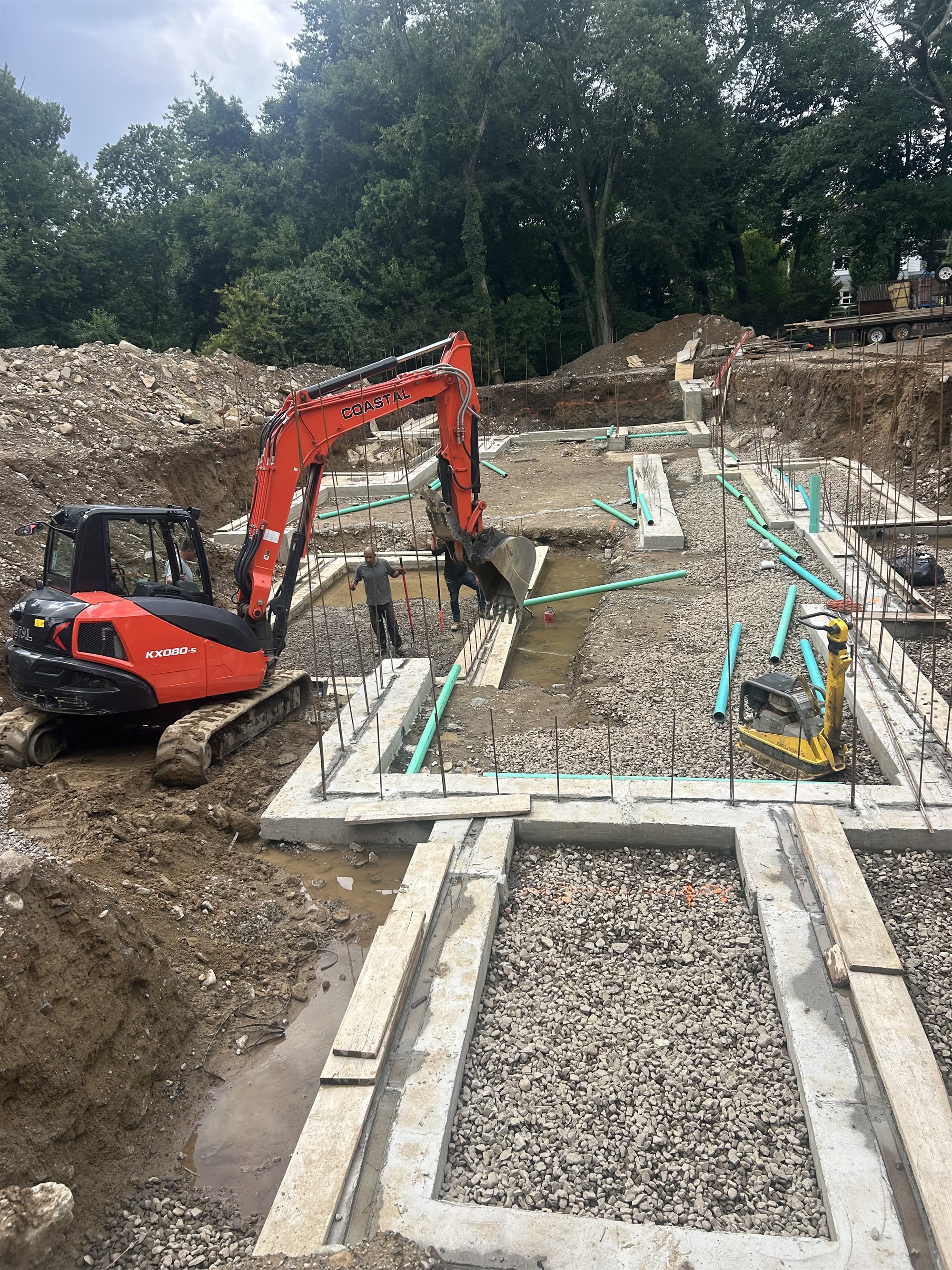 CLH Kubota excavator digging foundation footings on a Connecticut site